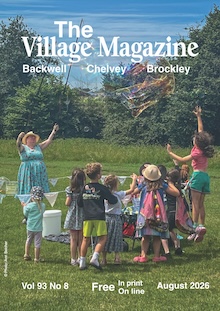 August 2026 cover, featuring children on the playing fields watching Backwell's bubble lady, Helen