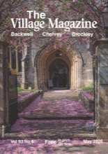 May 2026 cover, featuring cherry blossom covering the ground at the entrance to St Andrew's Church